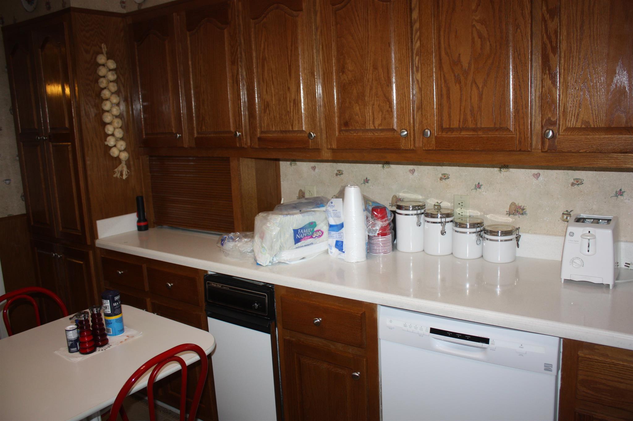 2756 Mt Zion Road Morrison, TN 37357 - Photo 18 of 30 a kitchen with a sink refrigerator and cabinets