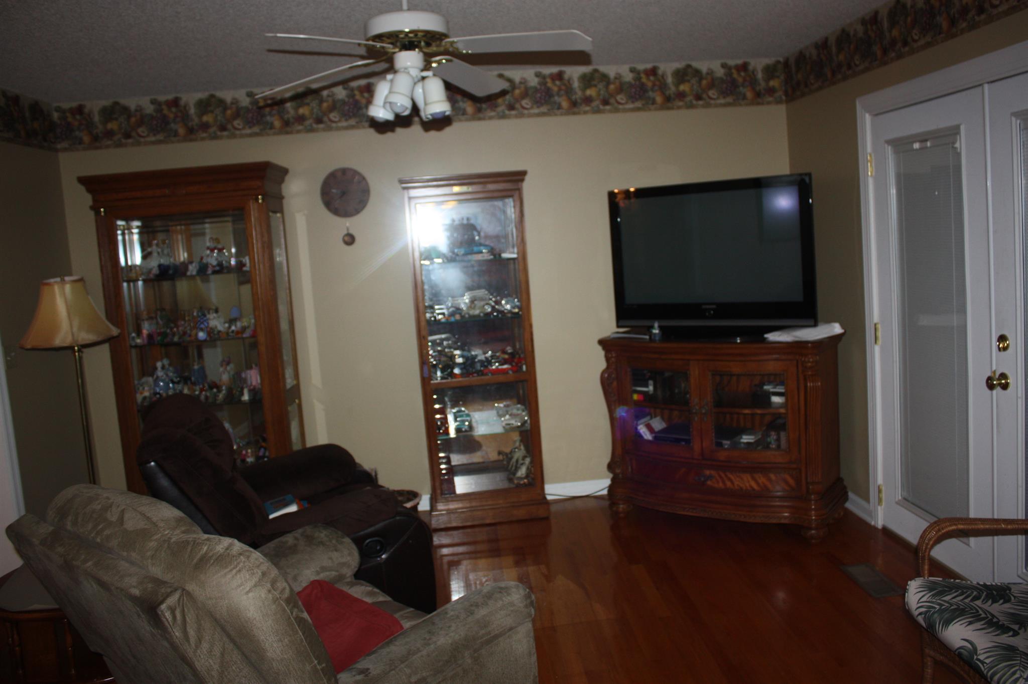 2756 Mt Zion Road Morrison, TN 37357 - Photo 25 of 30 a living room with furniture and a flat screen tv