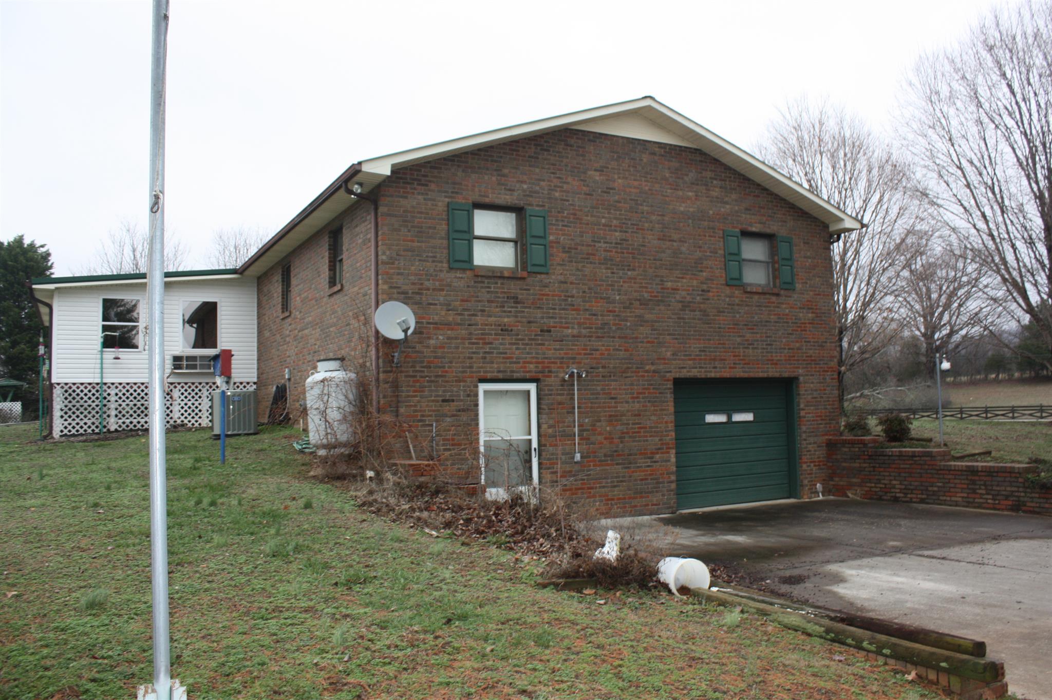2756 Mt Zion Road Morrison, TN 37357 - Photo 3 of 30 a front view of a house with a yard
