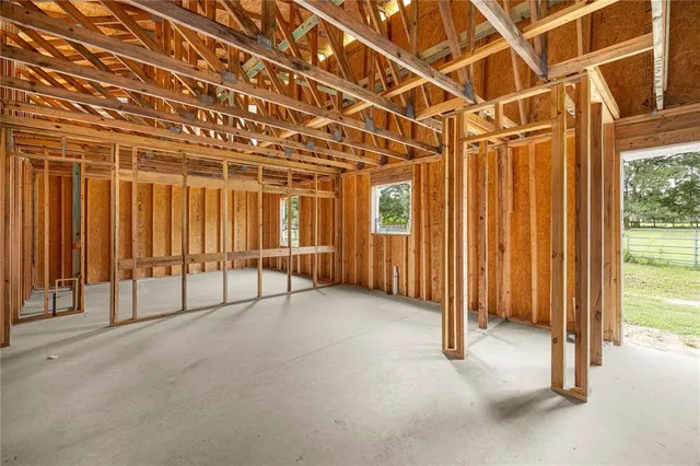 a view of a room with wooden walls