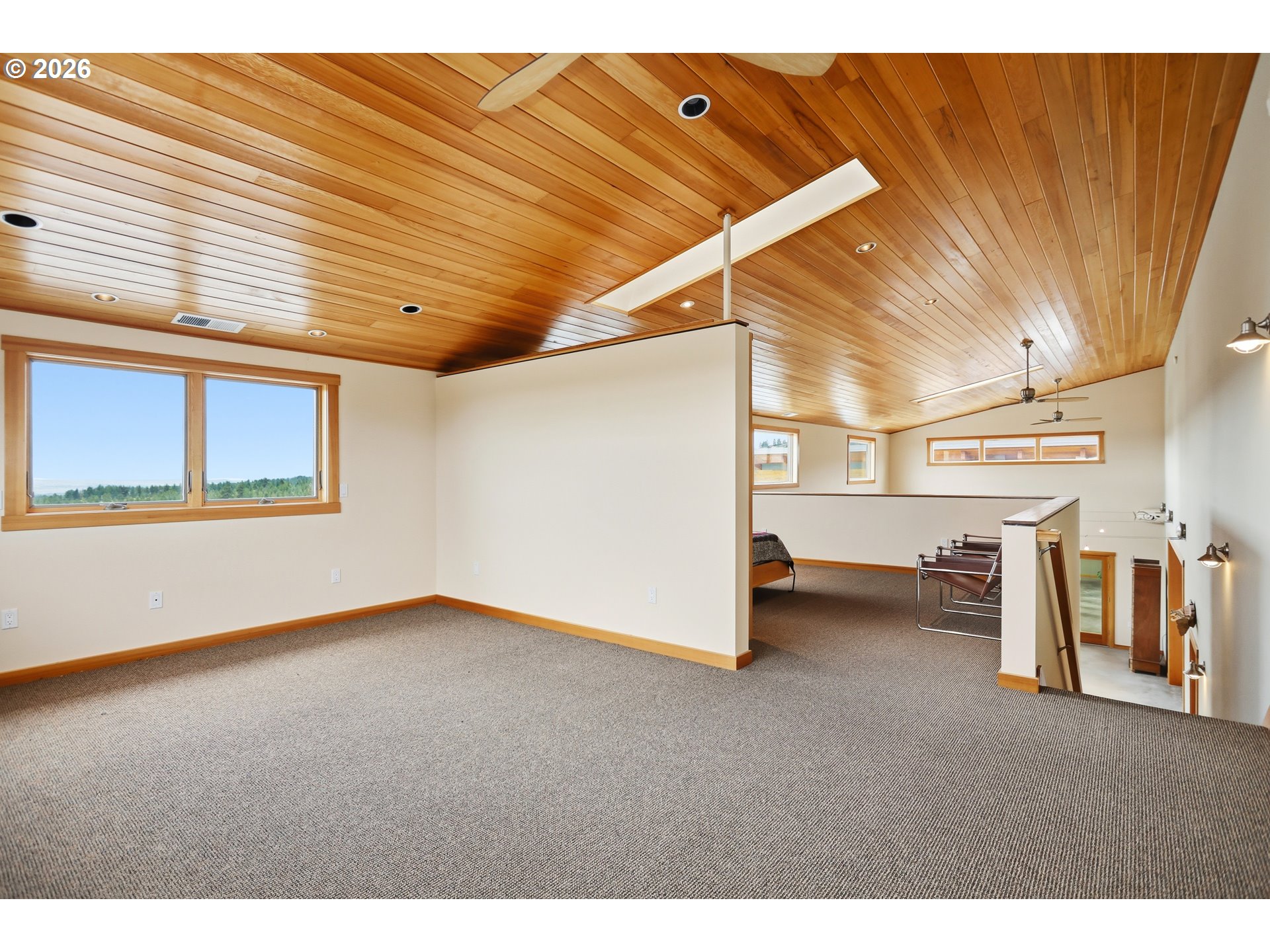 505 Knight Road Goldendale, WA 98620 - Photo 13 of 48 a view of a livingroom with an empty space and a window