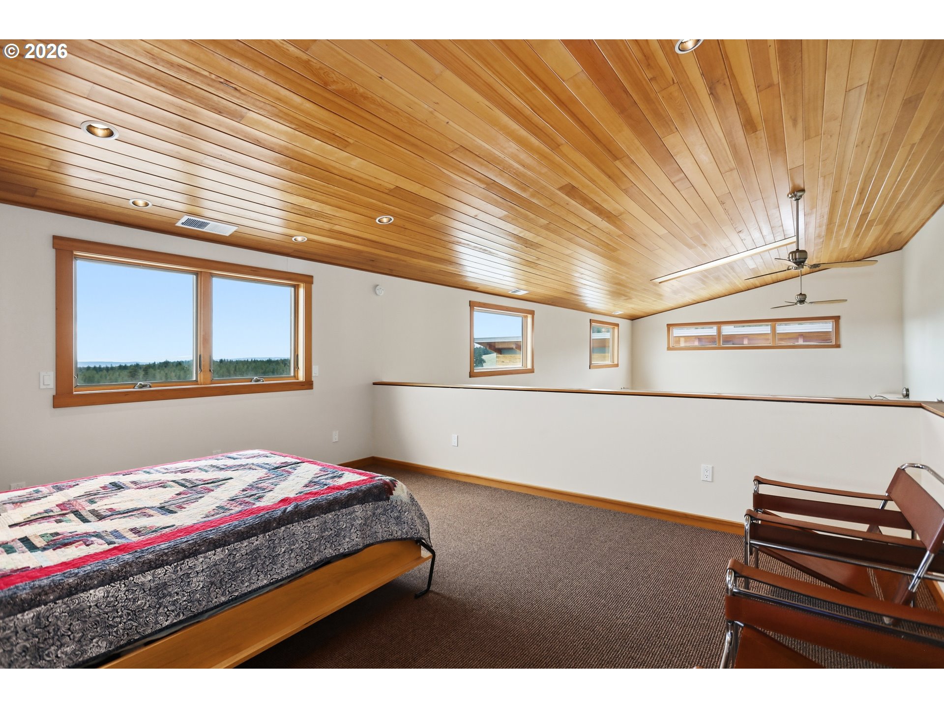 505 Knight Road Goldendale, WA 98620 - Photo 14 of 48 a bedroom with a bed and a view of wooden floor