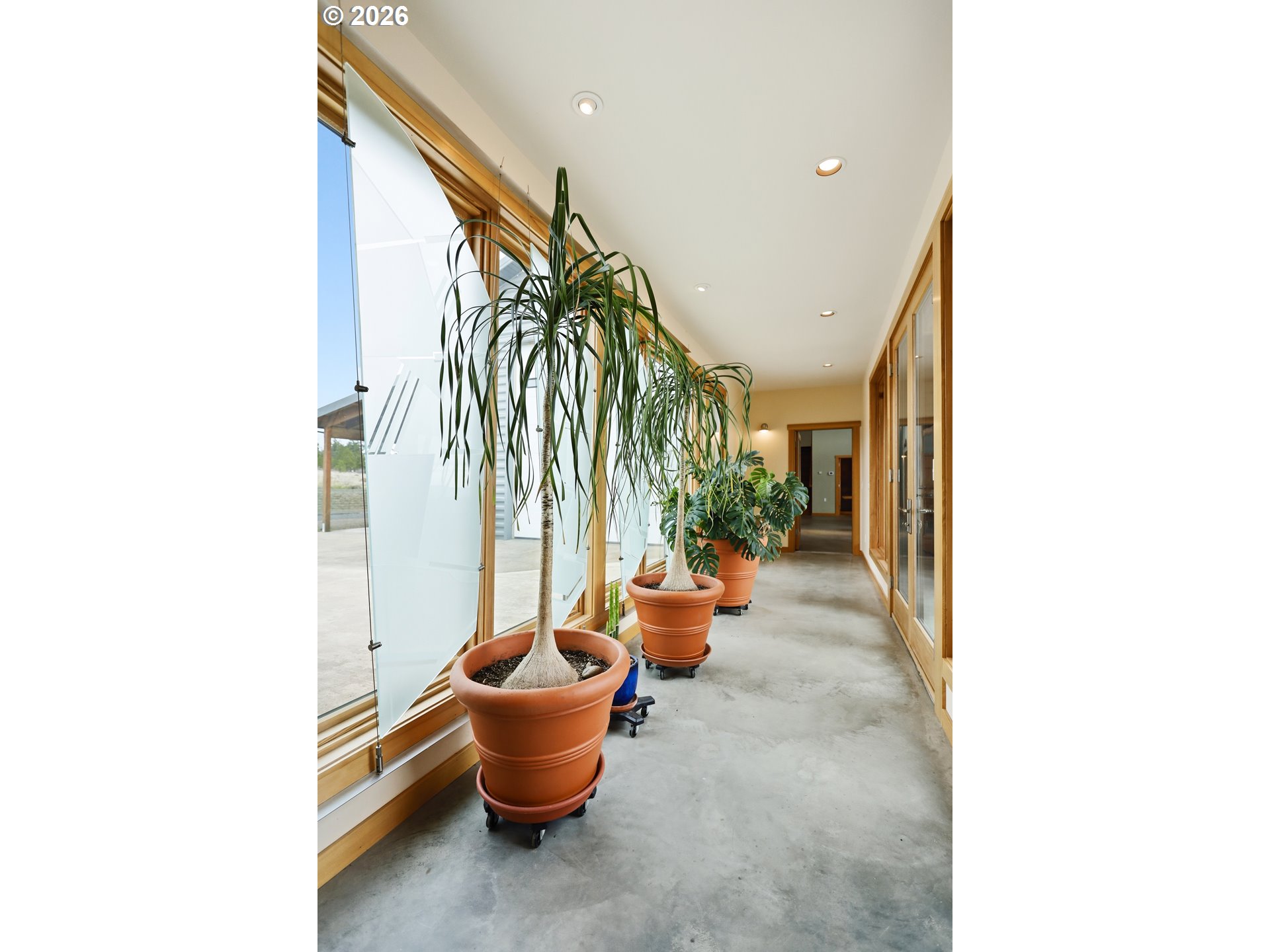 505 Knight Road Goldendale, WA 98620 - Photo 19 of 48 a living room with patio furniture and potted plants