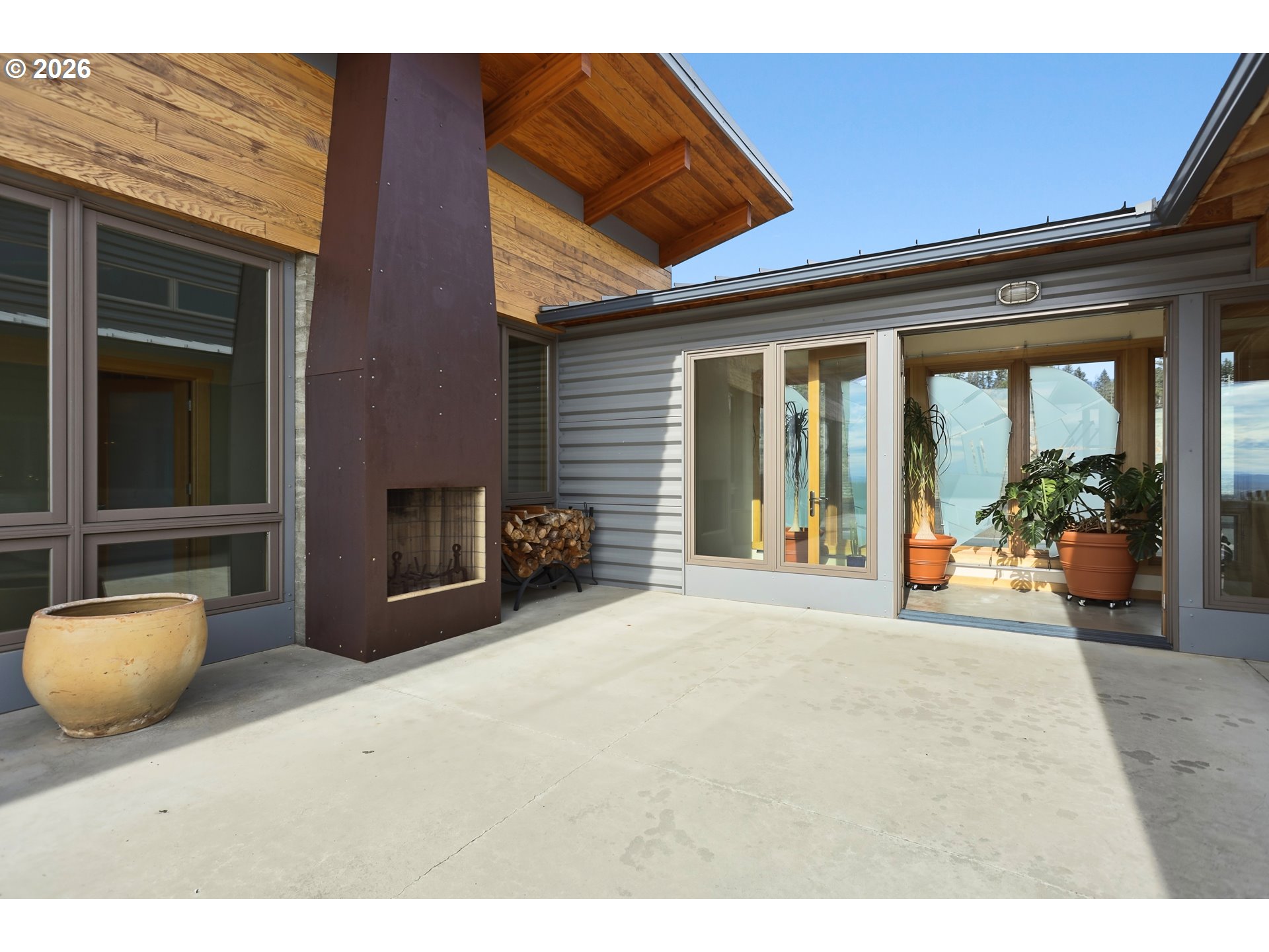 505 Knight Road Goldendale, WA 98620 - Photo 31 of 48 a view of a chairs and table in backyard of the house