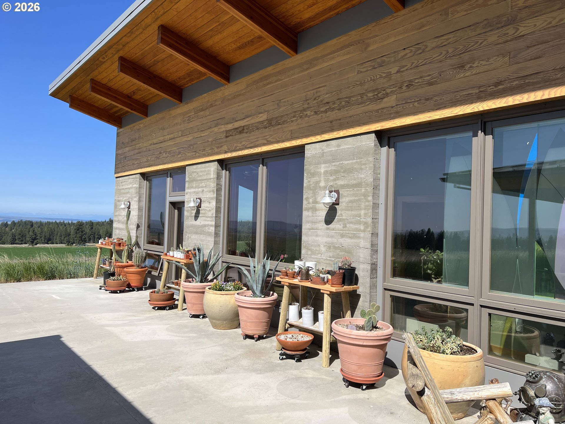 505 Knight Road Goldendale, WA 98620 - Photo 33 of 48 a view of a patio with lawn chairs couches and potted plants