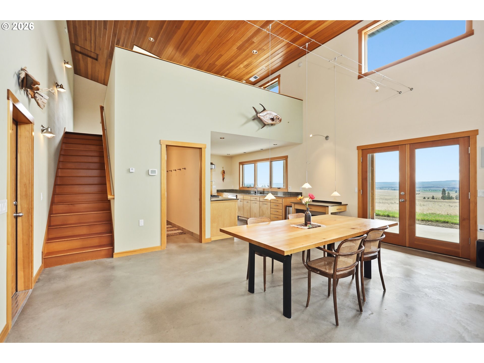 505 Knight Road Goldendale, WA 98620 - Photo 6 of 48 a view of a dining room with furniture and wooden floor