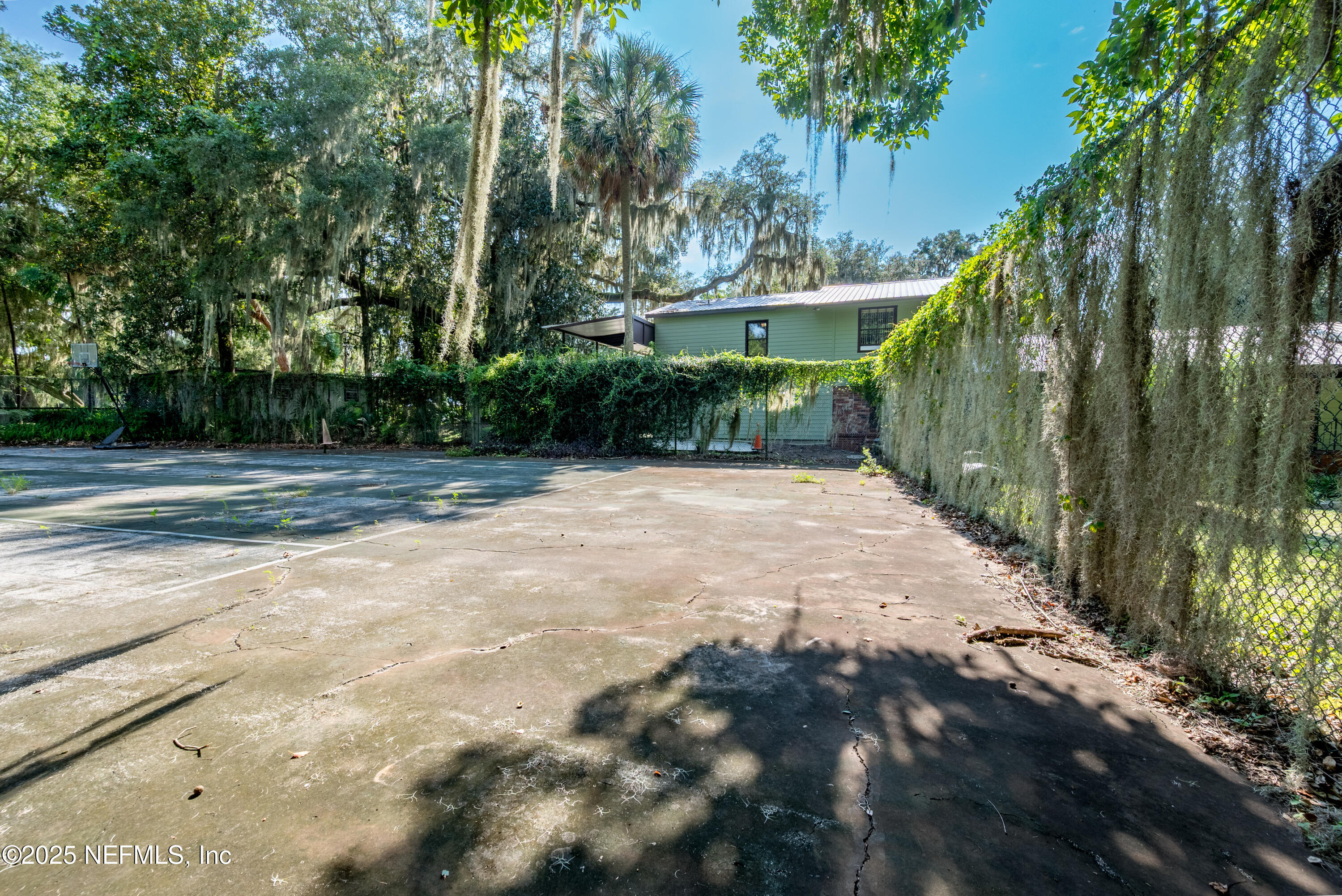 8166 Alderman Road Melrose, FL 32666 - Photo 16 of 94 a view of a street with a building in the background