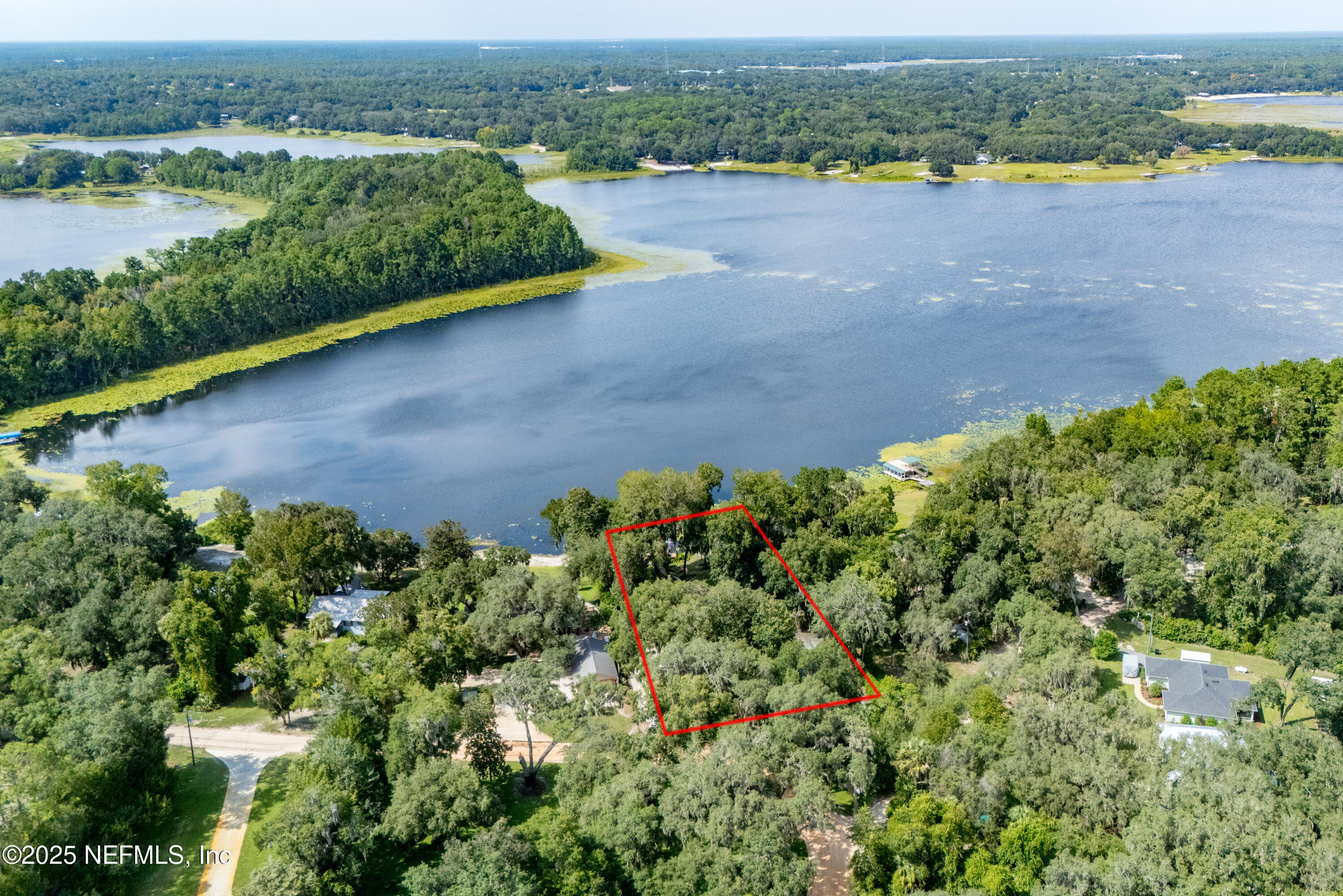 8166 Alderman Road Melrose, FL 32666 - Photo 37 of 94 an aerial view of a houses with yard