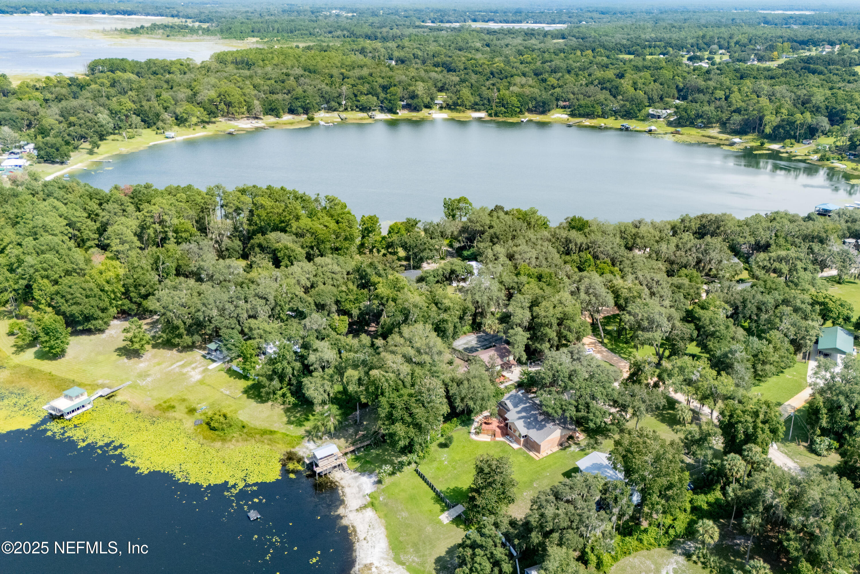 8166 Alderman Road Melrose, FL 32666 - Photo 41 of 94 an aerial view of a houses with yard