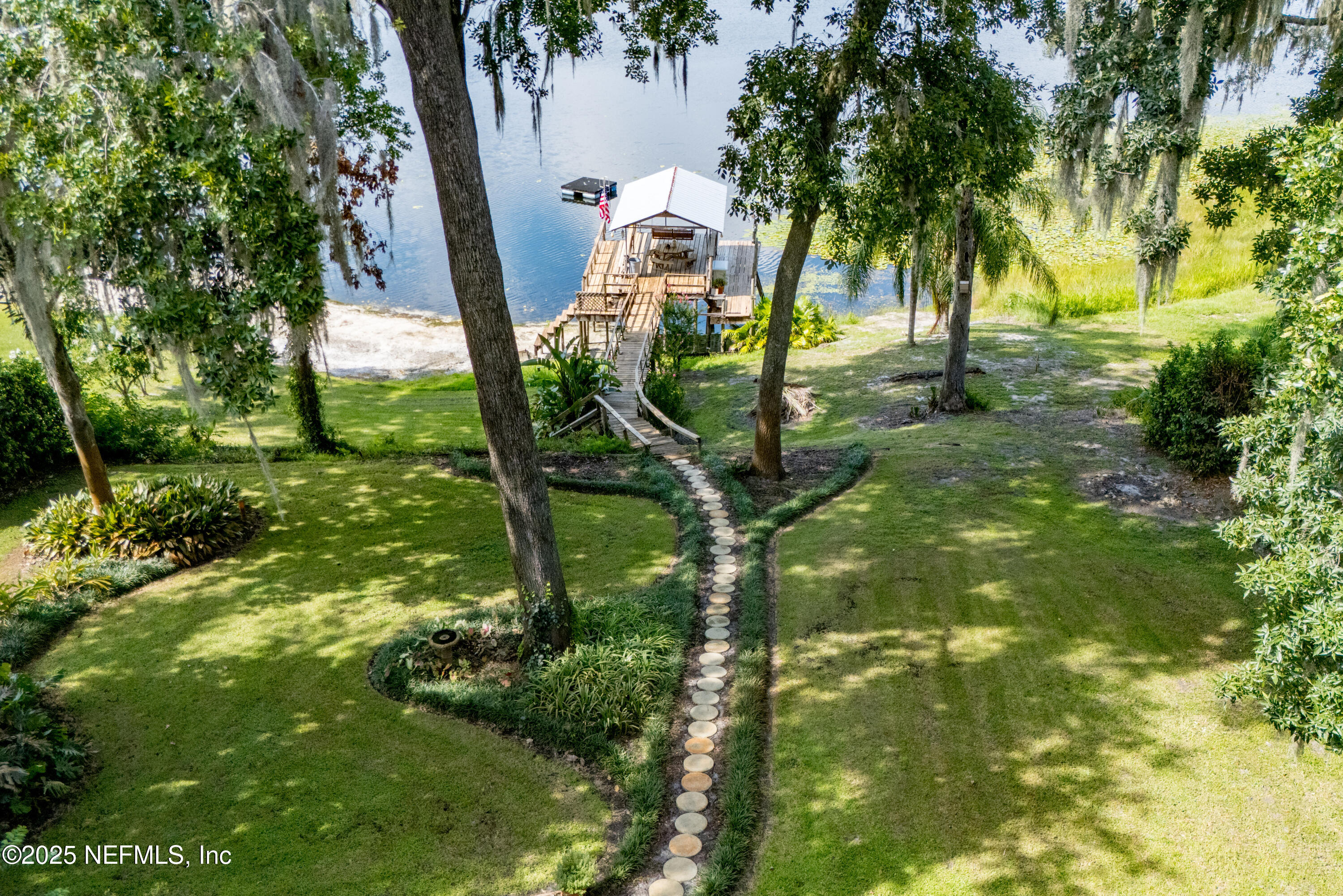 8166 Alderman Road Melrose, FL 32666 - Photo 48 of 94 a view of swimming pool of a yard
