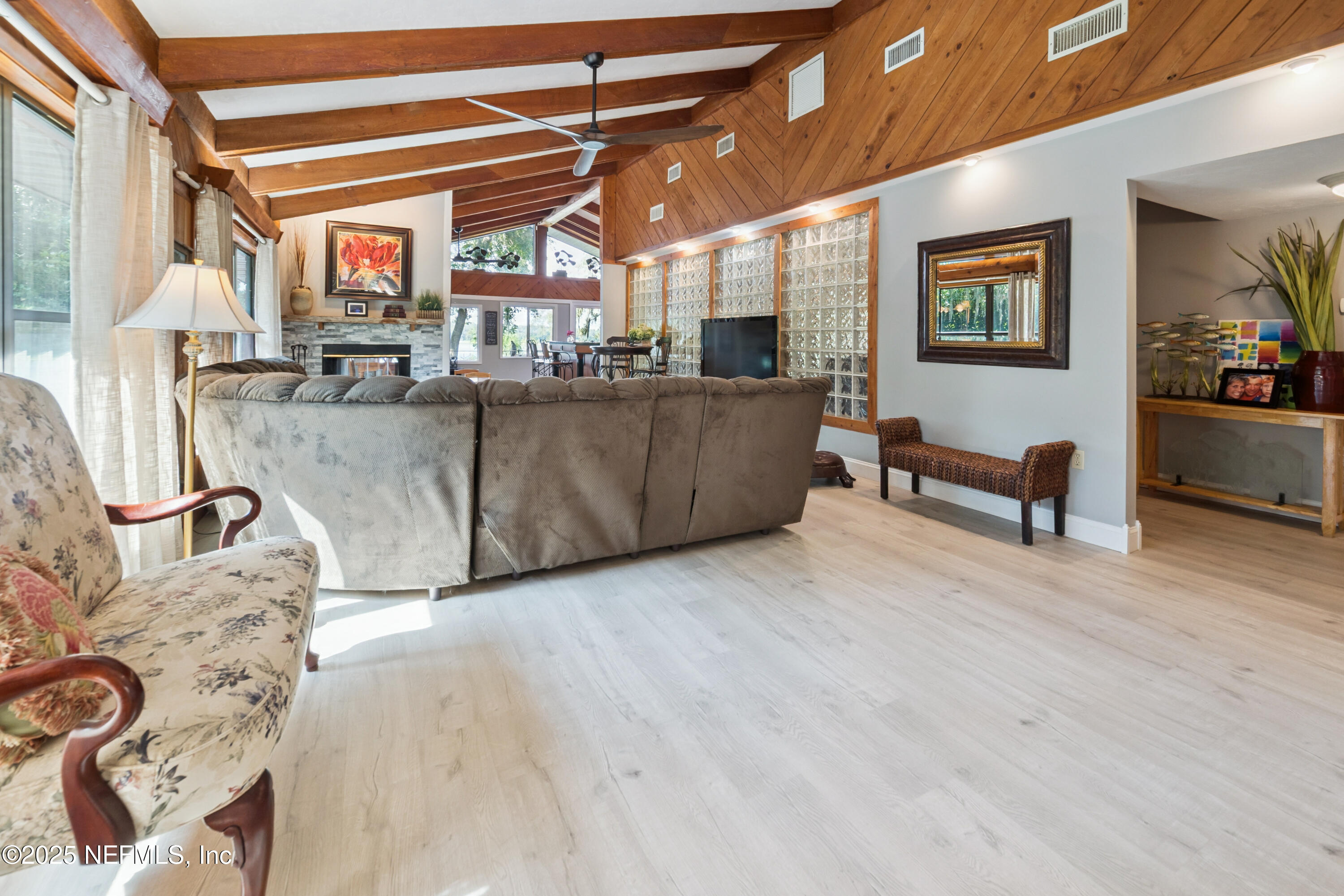 8166 Alderman Road Melrose, FL 32666 - Photo 57 of 94 a living room with furniture and a window