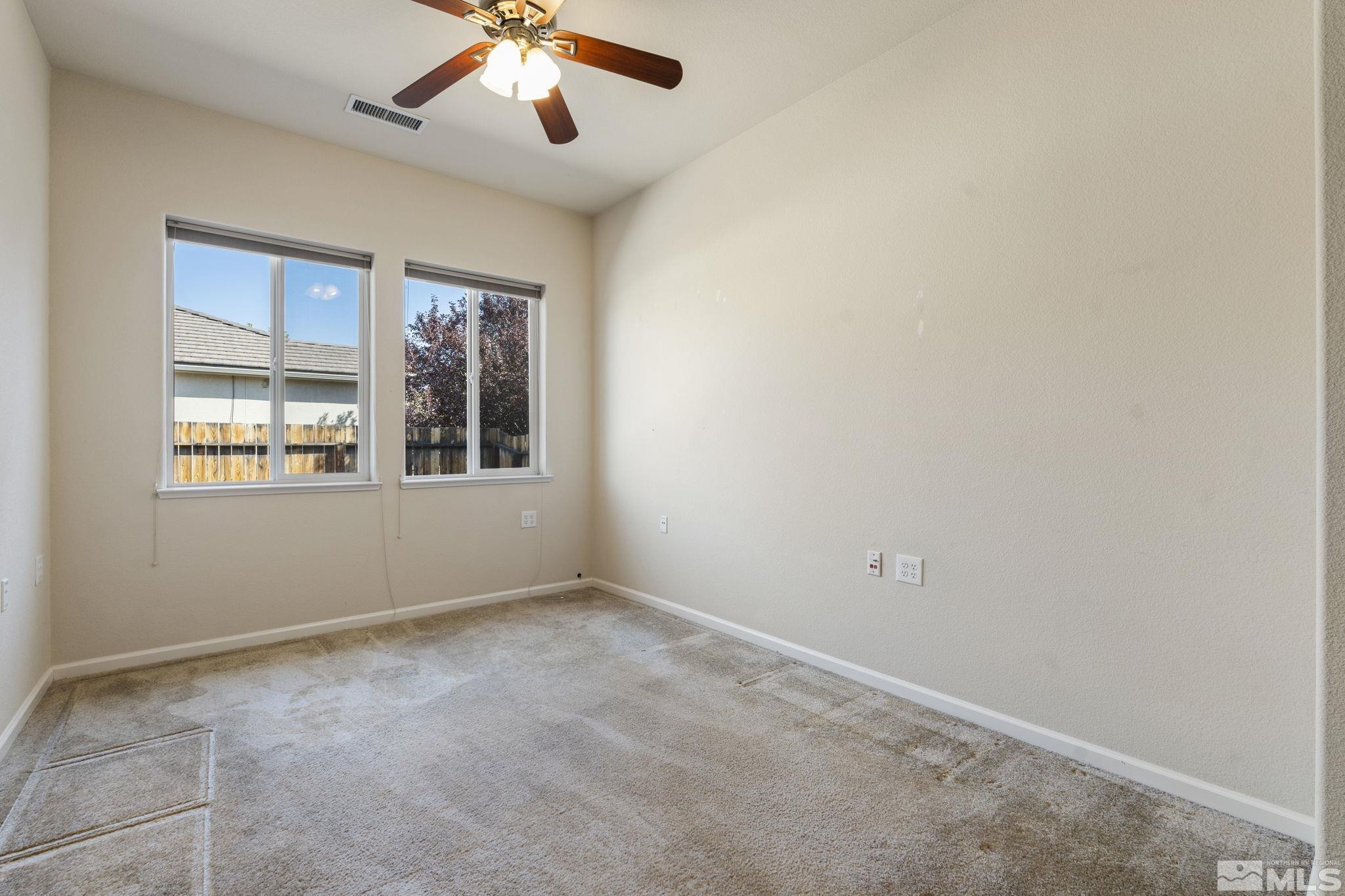 10295 Cavalry Circle Reno, NV 89521 - Photo 20 of 40 a view of an empty room with a window