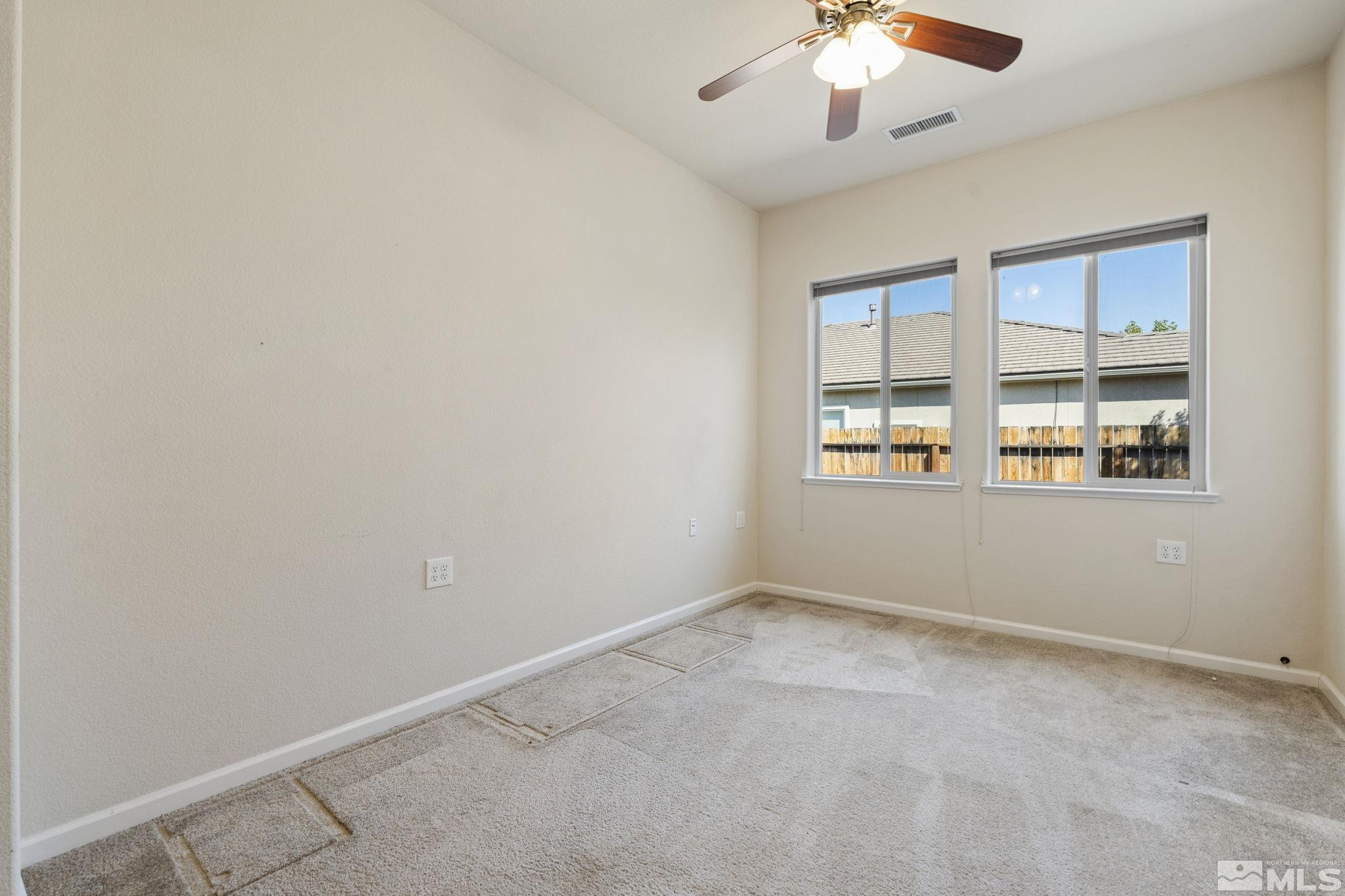 10295 Cavalry Circle Reno, NV 89521 - Photo 22 of 40 a view of an empty room with a window