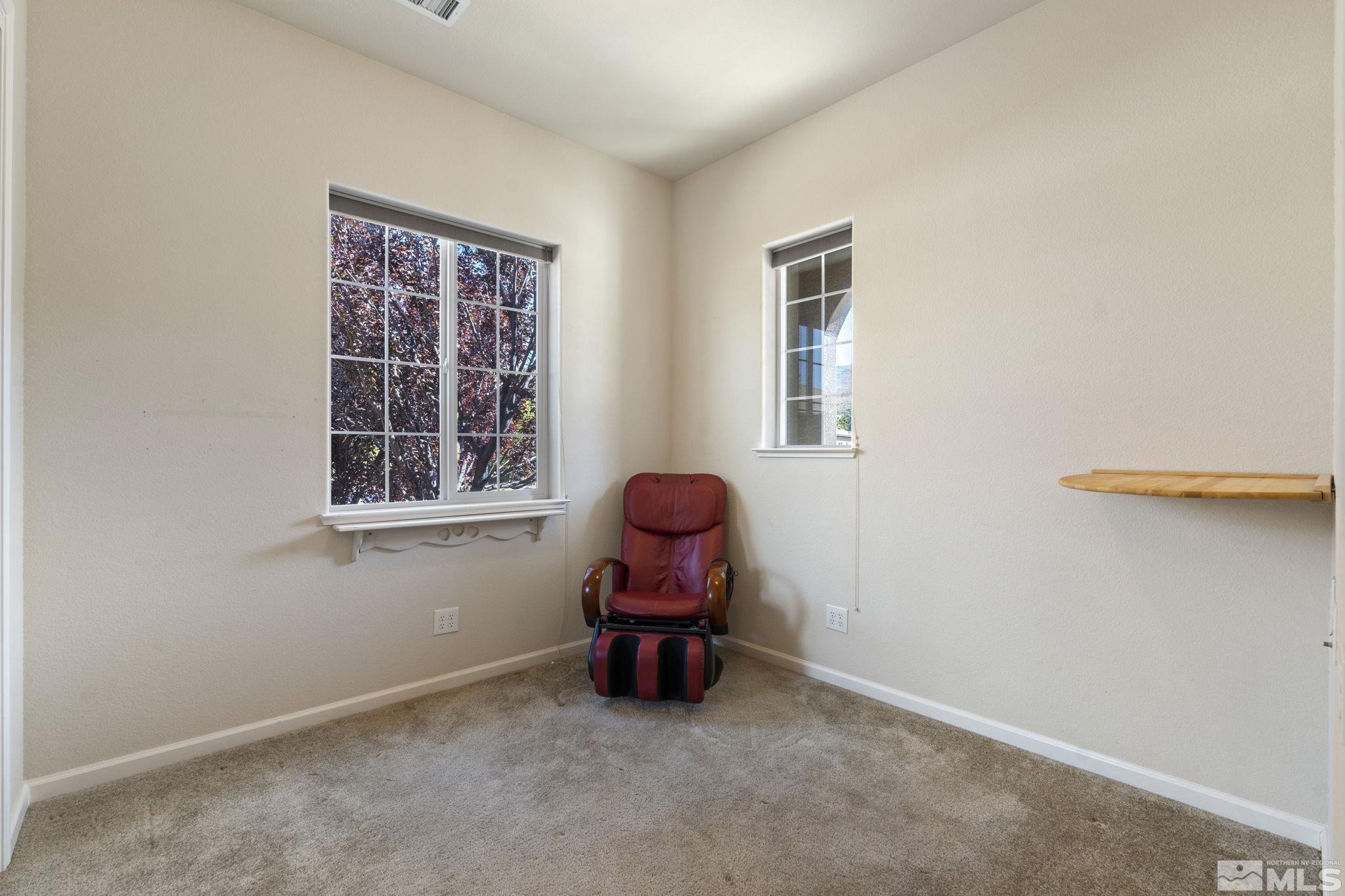 10295 Cavalry Circle Reno, NV 89521 - Photo 27 of 40 a living room with furniture and a window