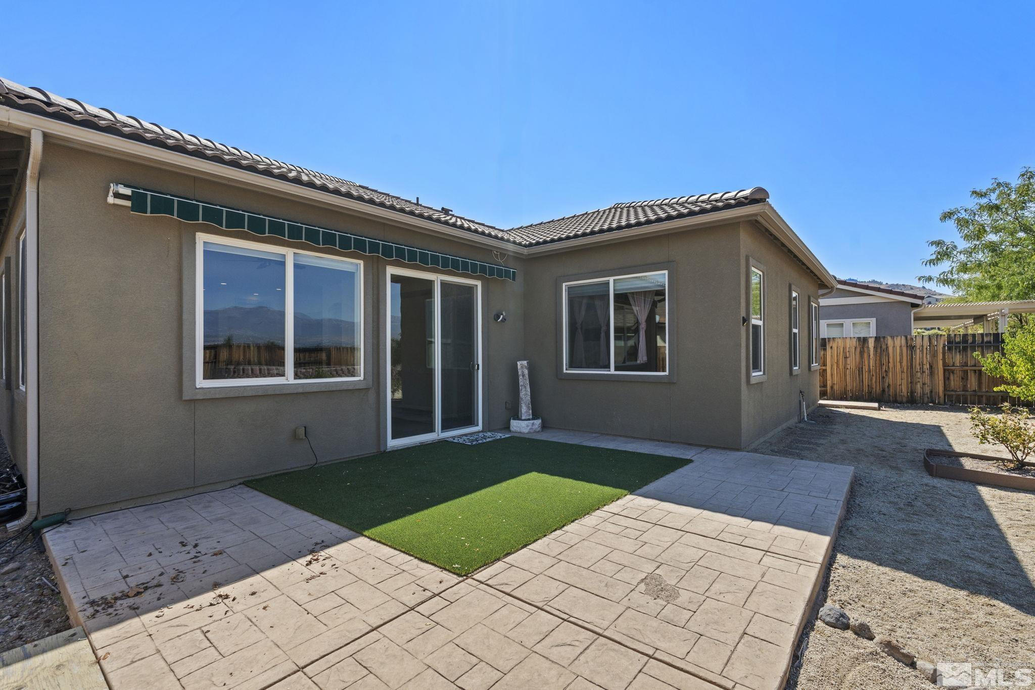 10295 Cavalry Circle Reno, NV 89521 - Photo 33 of 40 a front view of house with yard