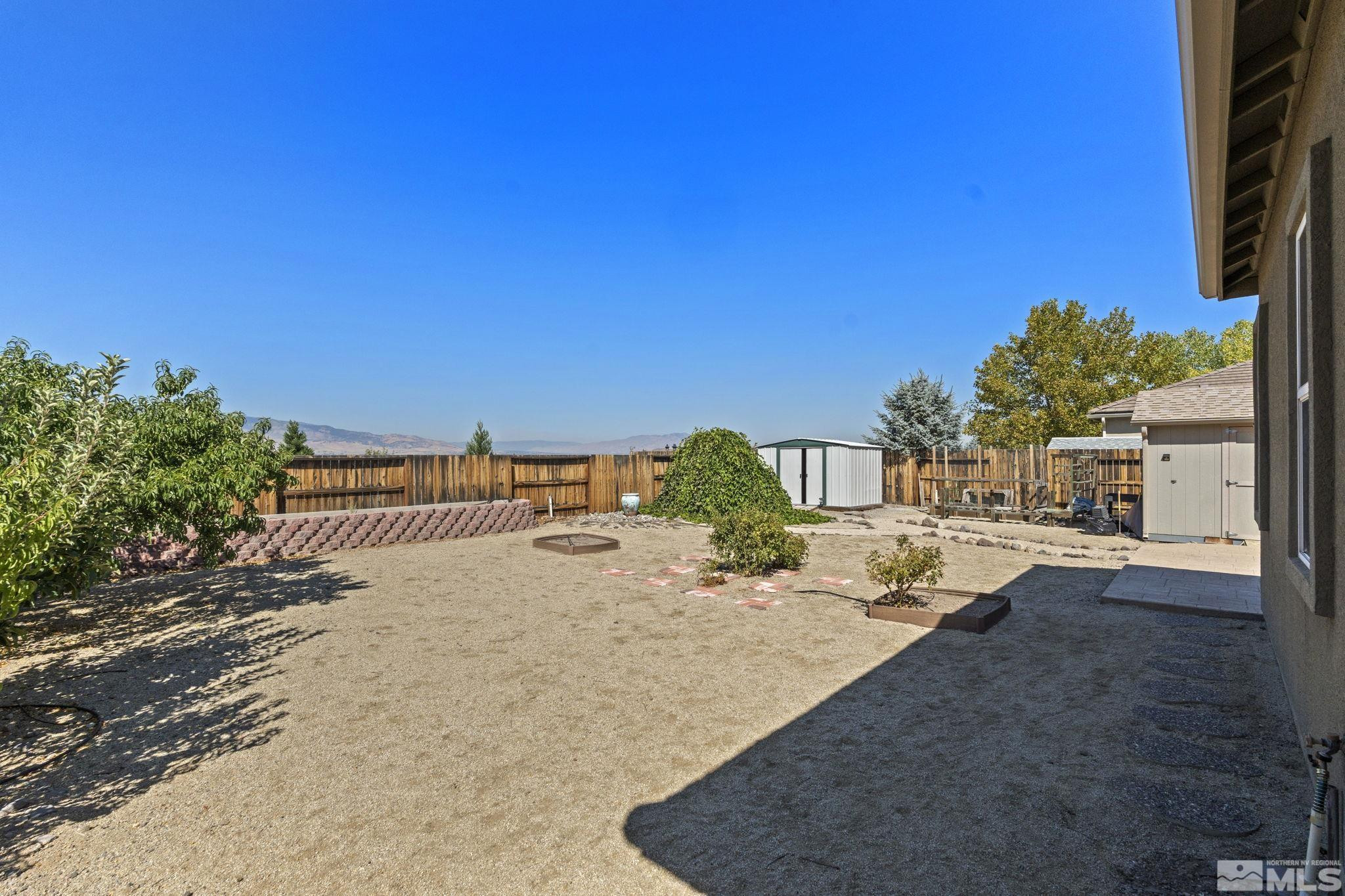 10295 Cavalry Circle Reno, NV 89521 - Photo 38 of 40 a view of a road with a building in the background