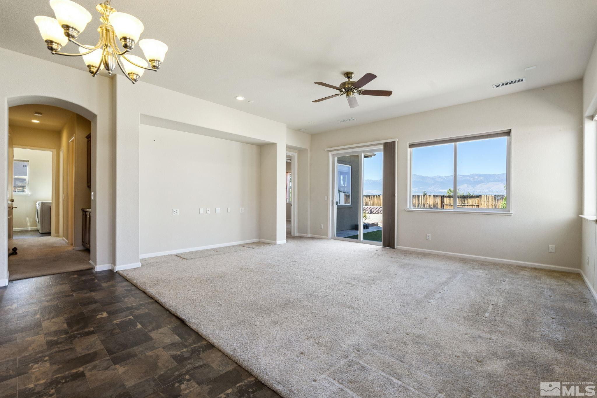 10295 Cavalry Circle Reno, NV 89521 - Photo 8 of 40 a view of an empty room with a window