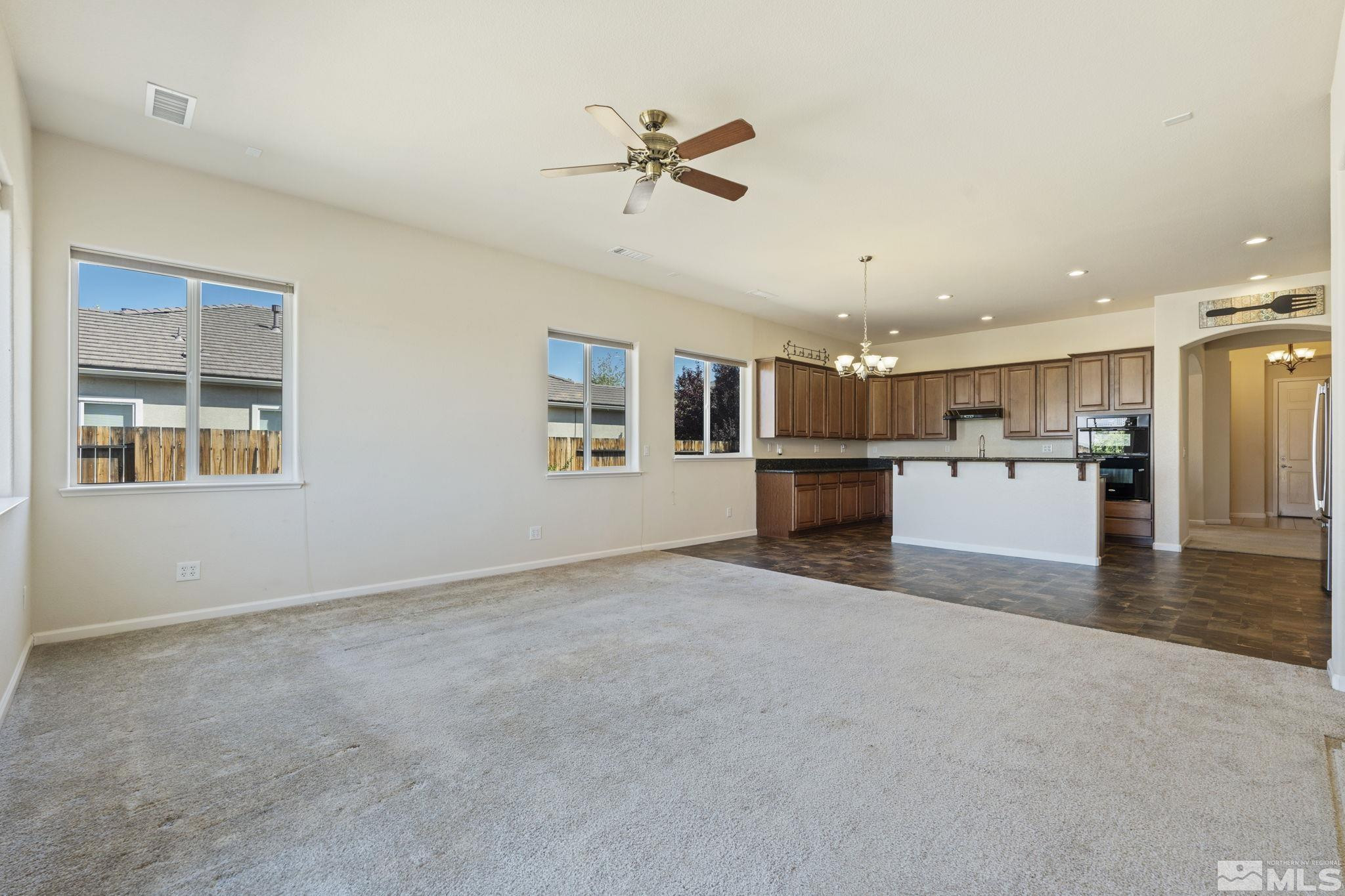 10295 Cavalry Circle Reno, NV 89521 - Photo 10 of 40 a view of a kitchen with furniture and a kitchen