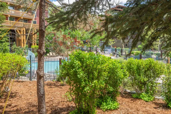 a house view with a backyard space