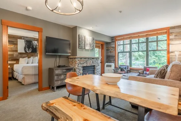 a view of a dining room with furniture window and outside view