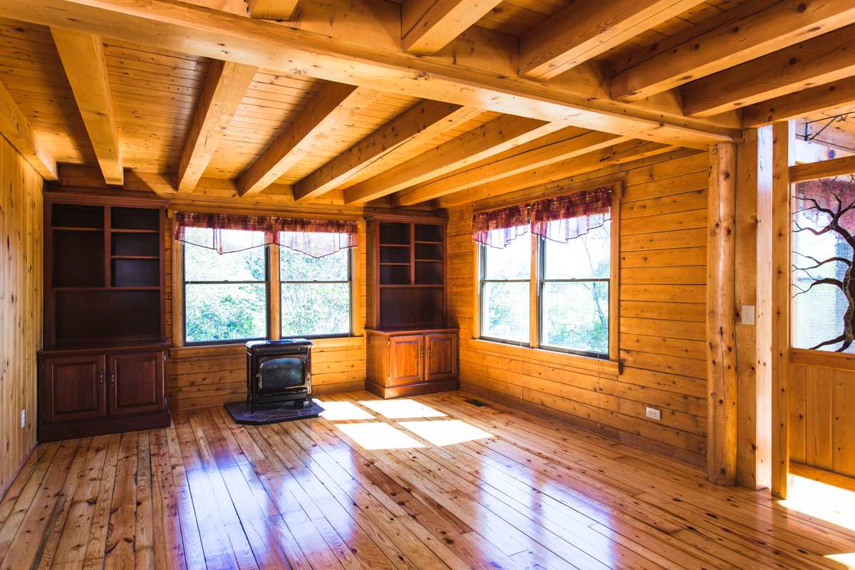 917 Roman Road Mount Sidney, VA 24467 - Photo 4 of 45 a view of empty room with wooden floor and fan