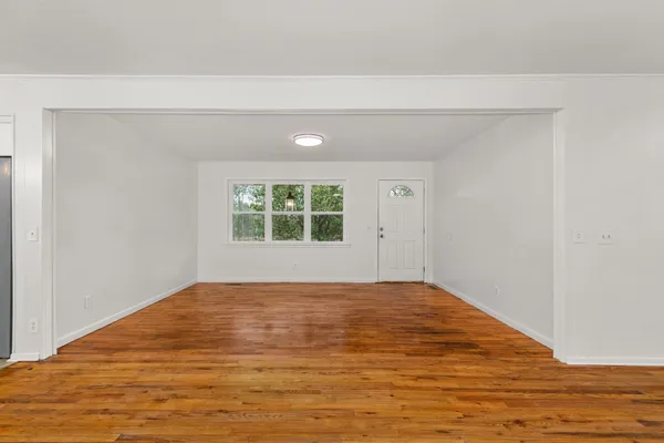 a view of an empty room with window