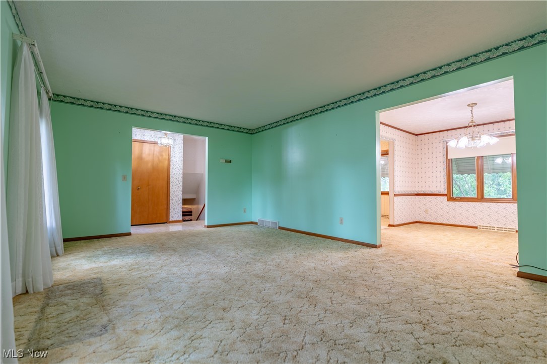 5535 Veldon Circle Northeast Canton, OH 44721 - Photo 3 of 41 Spacious carpeted living room.