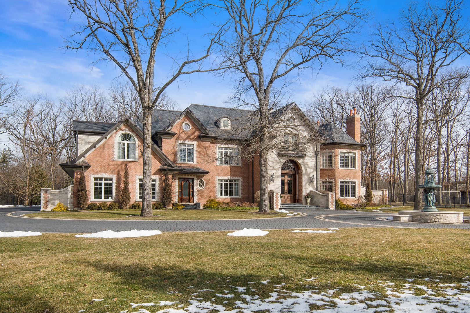 20 Old Mill Road Lake Forest, IL 60045 - Photo 2 of 64 a front view of residential houses with yard and trees