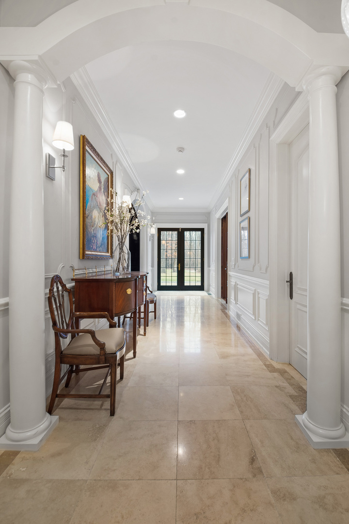 20 Old Mill Road Lake Forest, IL 60045 - Photo 22 of 64 a living room with furniture and a large window
