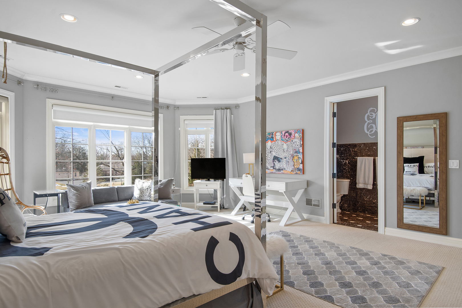 20 Old Mill Road Lake Forest, IL 60045 - Photo 40 of 64 a bedroom with a bed large window and a flat screen tv