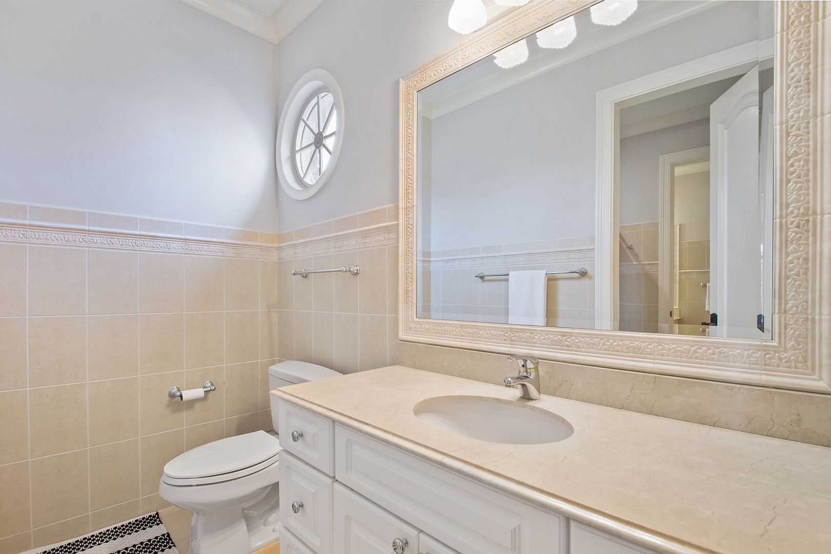 20 Old Mill Road Lake Forest, IL 60045 - Photo 44 of 64 a bathroom with a sink and a toilet