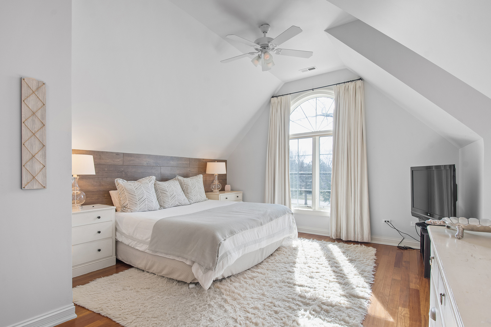 20 Old Mill Road Lake Forest, IL 60045 - Photo 48 of 64 a bedroom with a large bed and a window