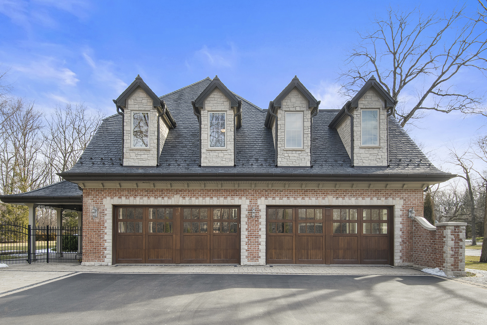 20 Old Mill Road Lake Forest, IL 60045 - Photo 60 of 64 a front view of a house with a yard and garage