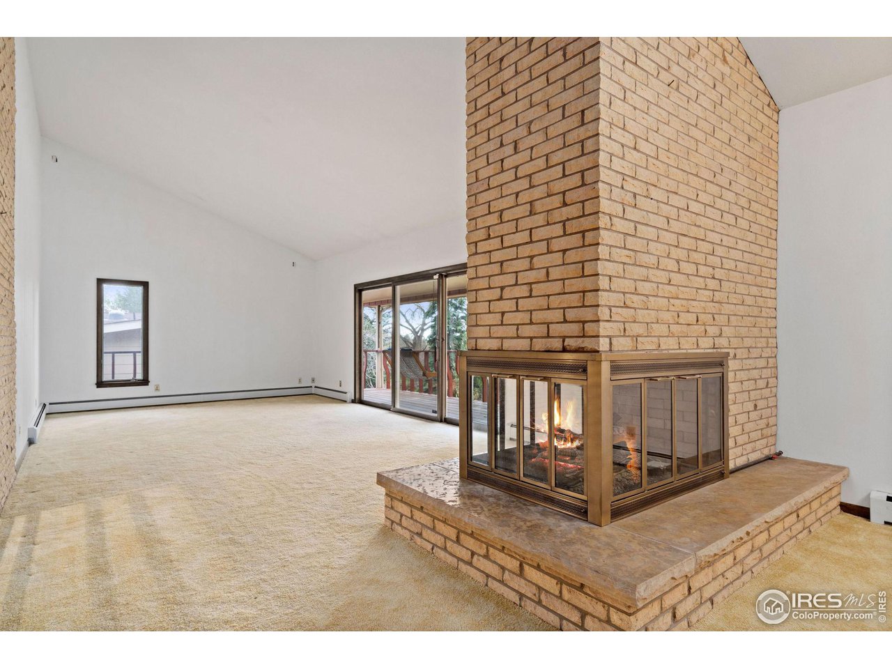 3535 Terry Ridge Road Fort Collins, CO 80524 - Photo 10 of 30 Double sided gas fireplace.