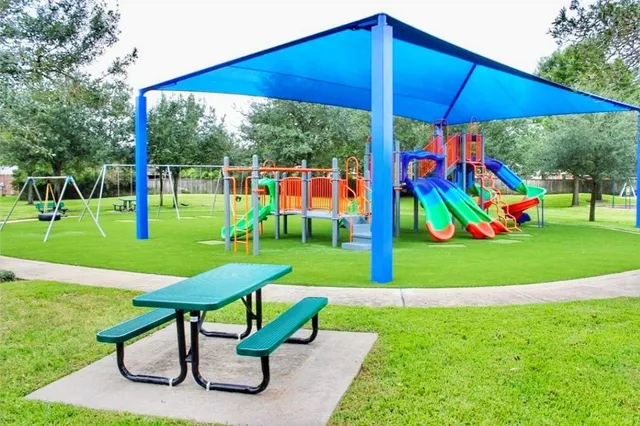 a view of a park with slide