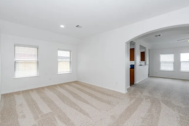 a view of an empty room with window