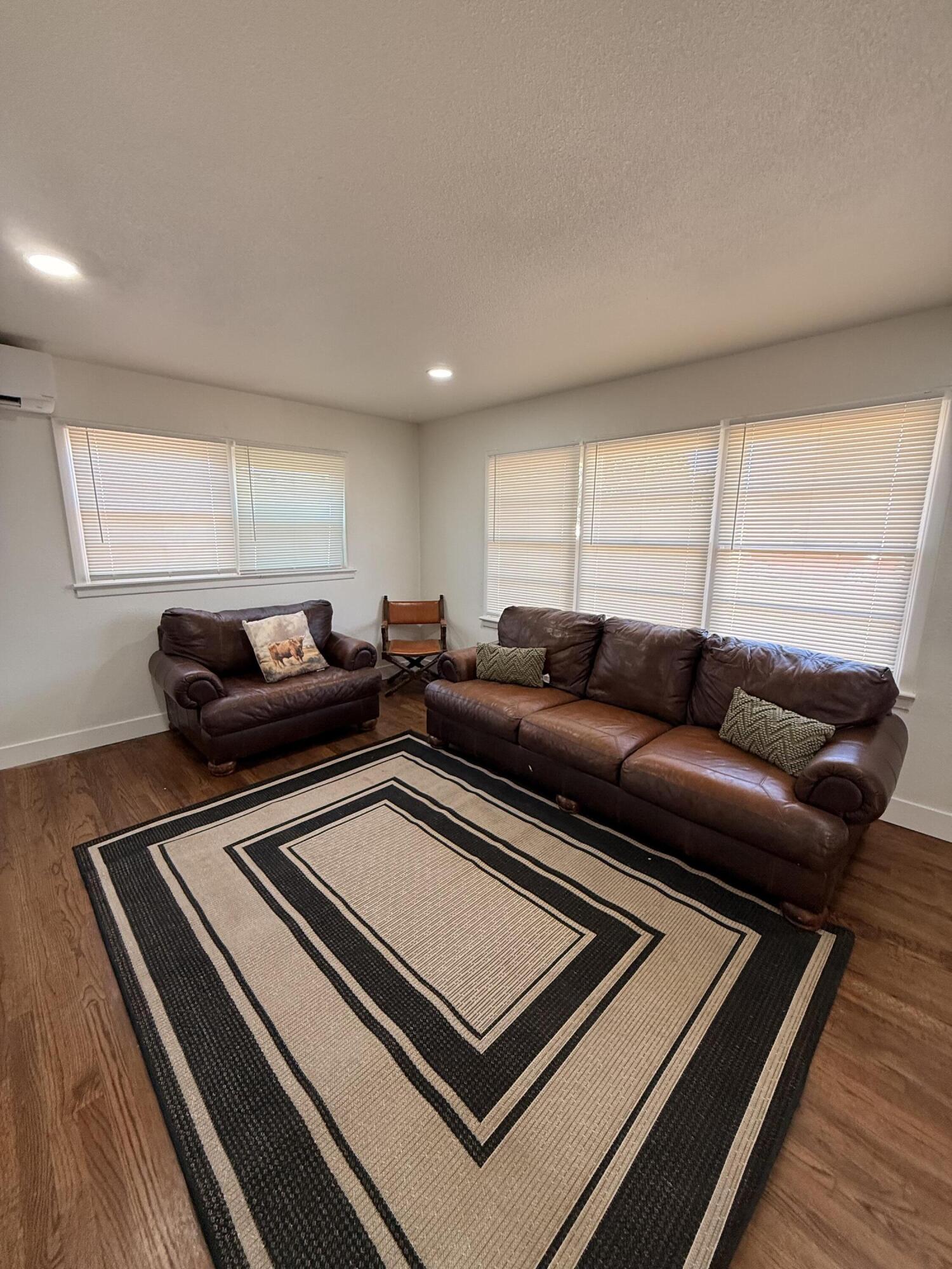 4601 43rd Street Lubbock, TX 79414 - Photo 8 of 12 a living room with furniture