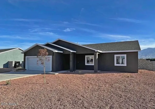 a front view of house with yard