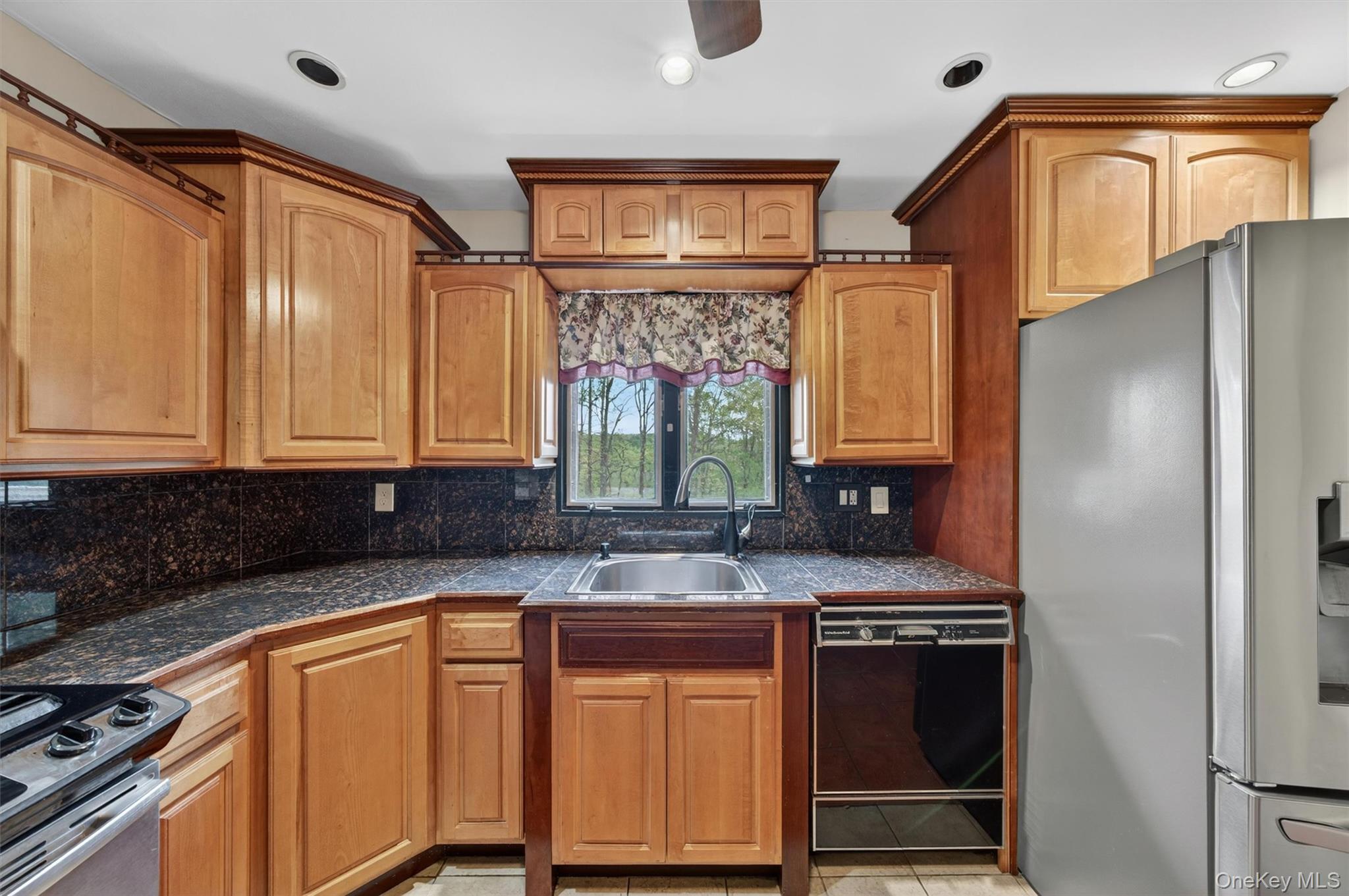 155 Pine Tree Road Monroe, NY 10950 - Photo 15 of 49 a kitchen with stainless steel appliances granite countertop a sink stove and refrigerator