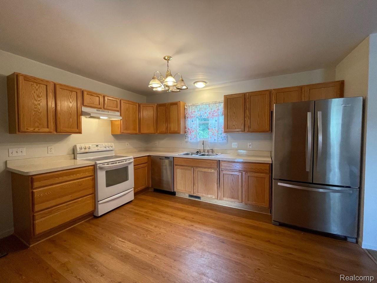 5099 Culver Road Brighton, MI 48114 - Photo 8 of 14 Large, bright kitchen includes all appliances.