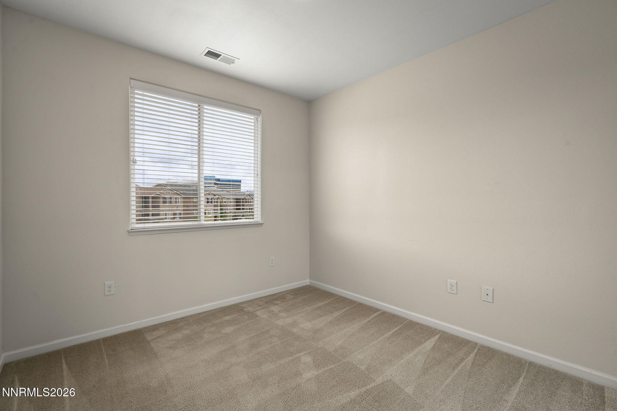 2490 Eastshore Place, Unit 104 Reno, NV 89509 - Photo 17 of 29 an empty room with a window