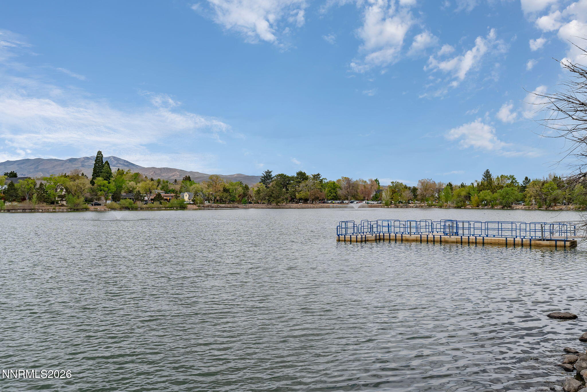 2490 Eastshore Place, Unit 104 Reno, NV 89509 - Photo 24 of 29 a view of a lake with houses in the back