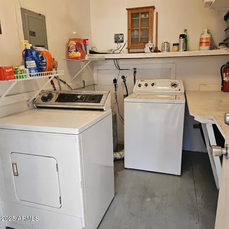 a utility room with dryer and washer