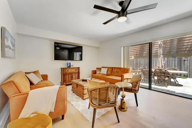 a bathroom with a sink mirror and toilet