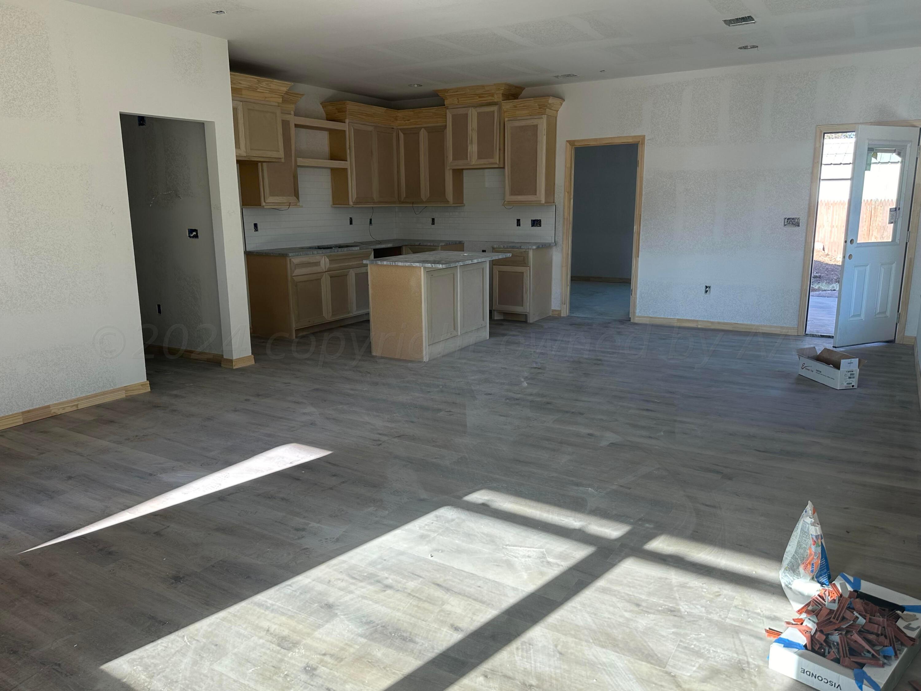 4104 Crockett Street Amarillo, TX 79110 - Photo 4 of 11 Living Room/Kitchen 2