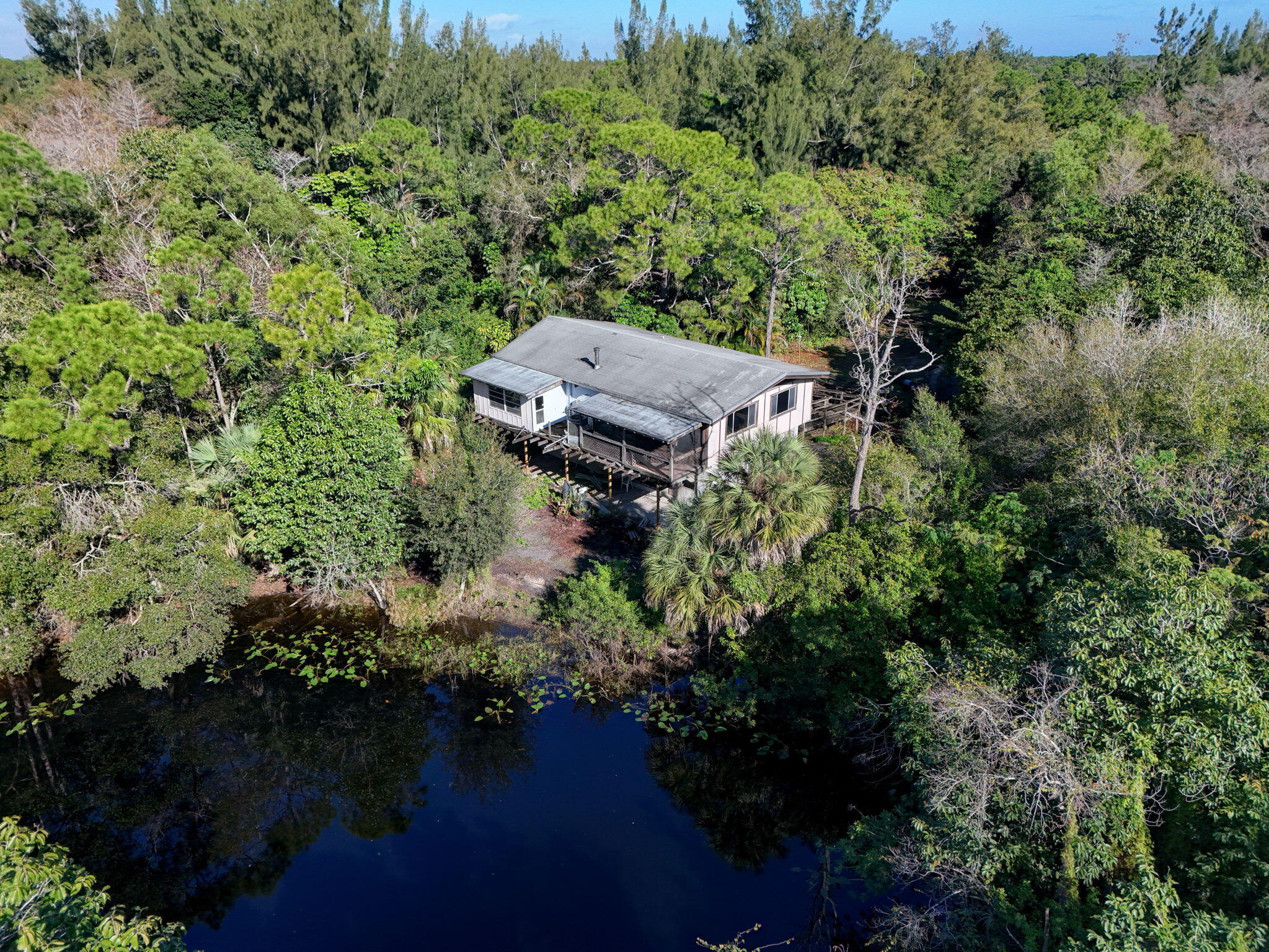 9620 171st Street North Jupiter, FL 33478 - Photo 13 of 23 a view of a house with a yard