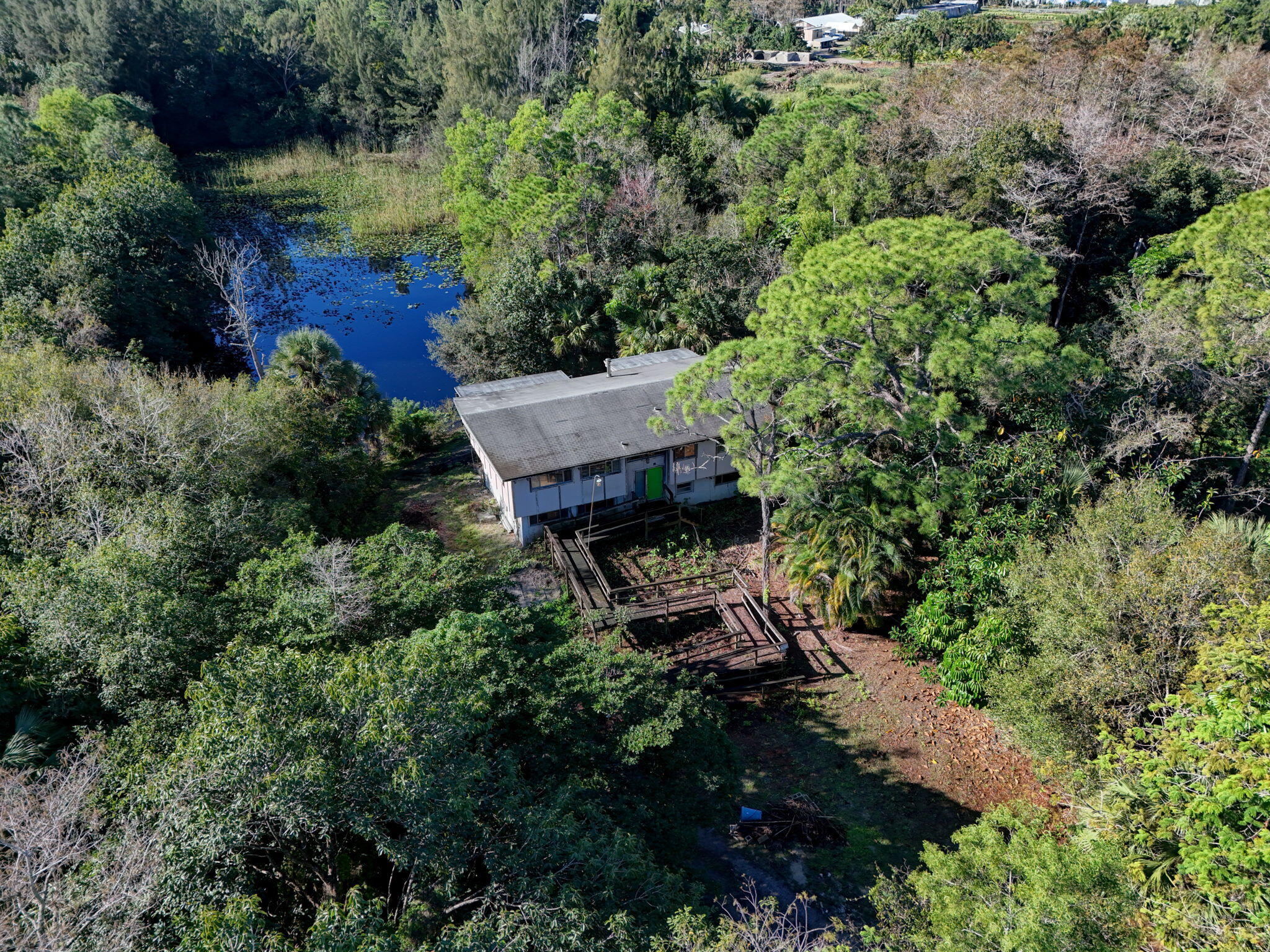 9620 171st Street North Jupiter, FL 33478 - Photo 14 of 23 an aerial view of a house with a yard