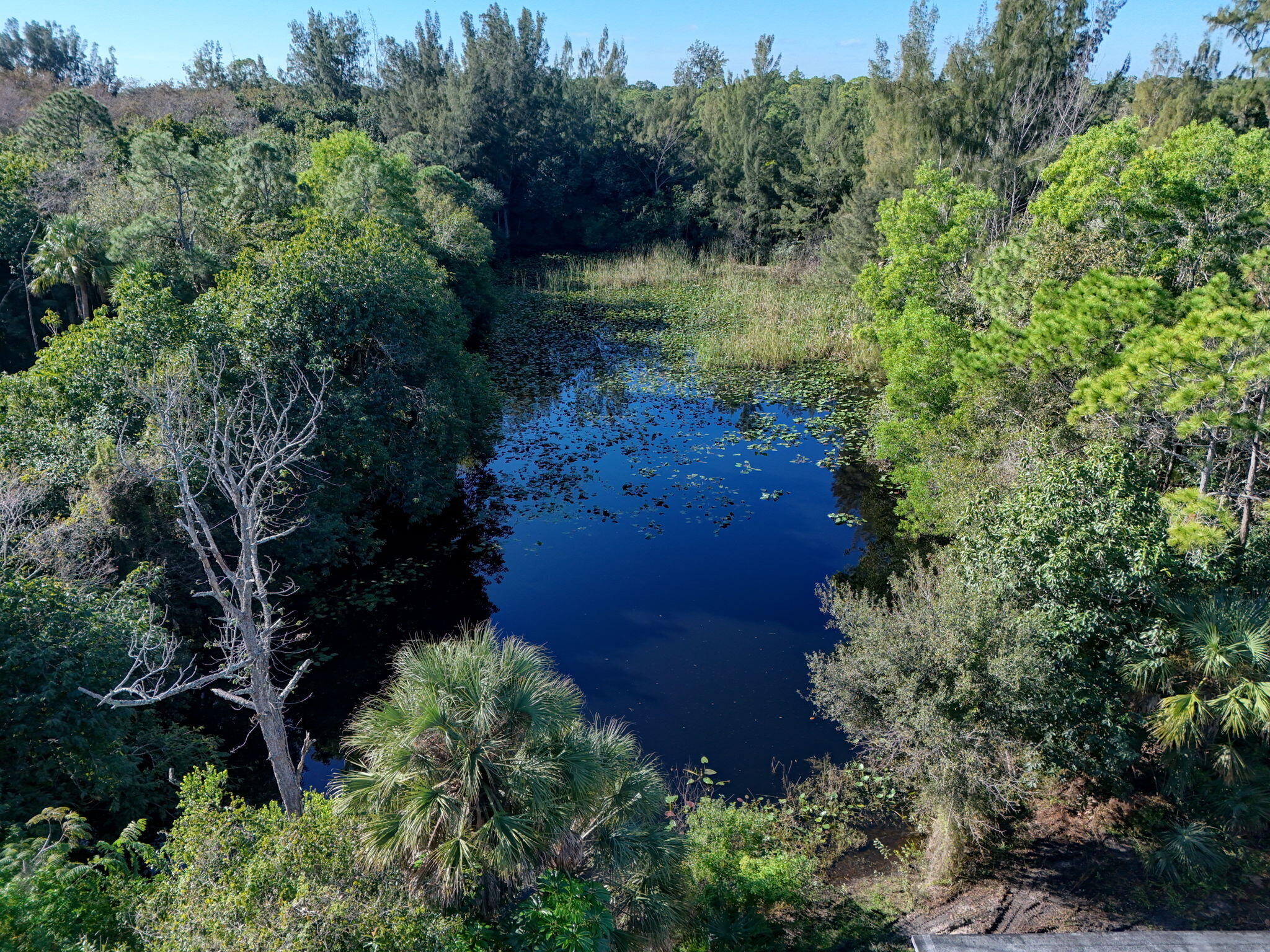 9620 171st Street North Jupiter, FL 33478 - Photo 16 of 23 an aerial view of a house with a yard