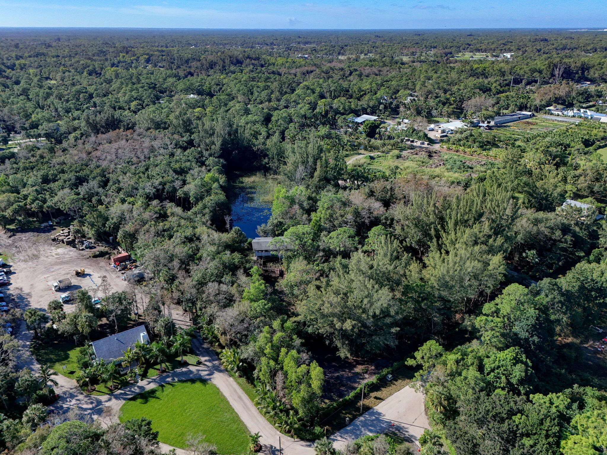 9620 171st Street North Jupiter, FL 33478 - Photo 17 of 23 an aerial view of a house with a yard