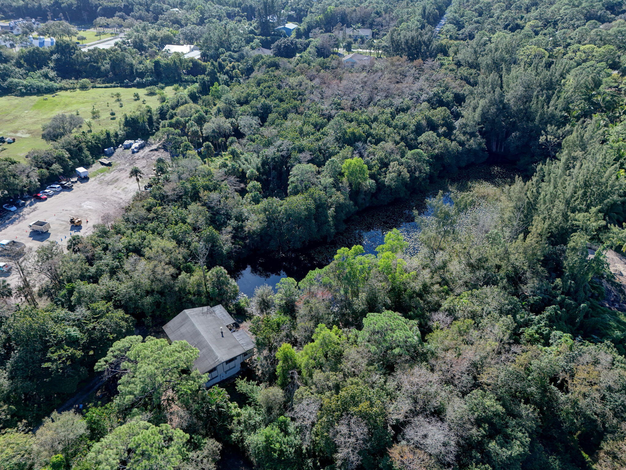 9620 171st Street North Jupiter, FL 33478 - Photo 20 of 23 a view of a garden with a building